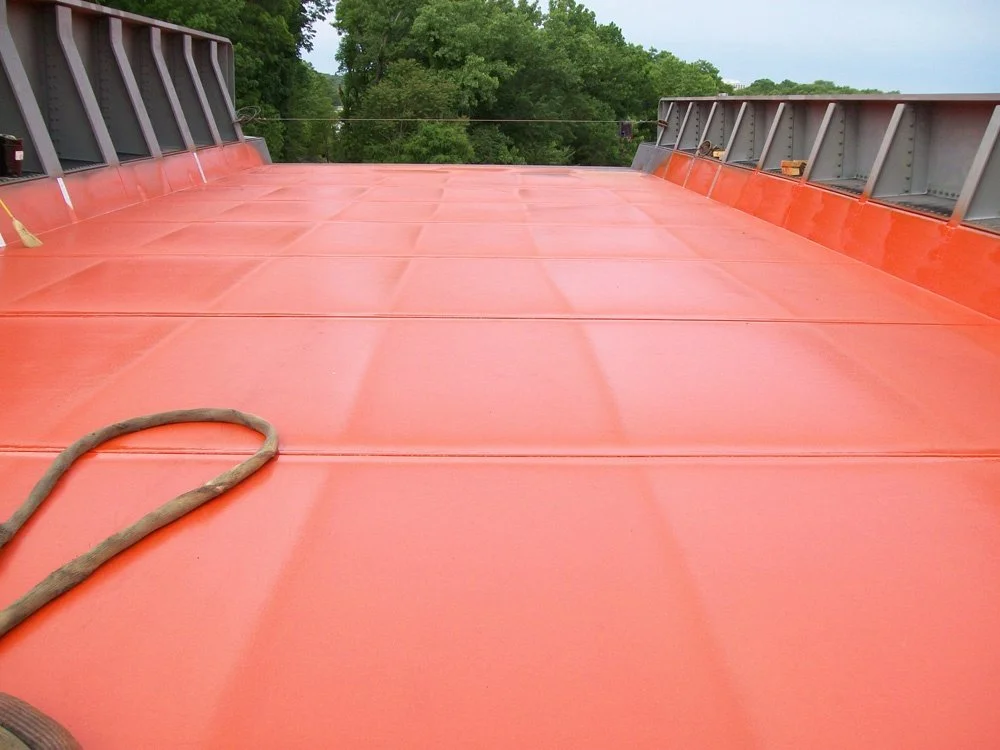 Bridge deck protected with polyurea coating